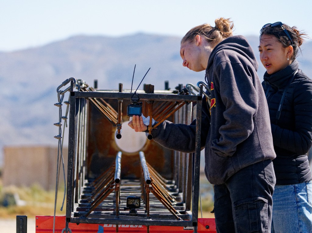 Working on a rocket frame outdoors